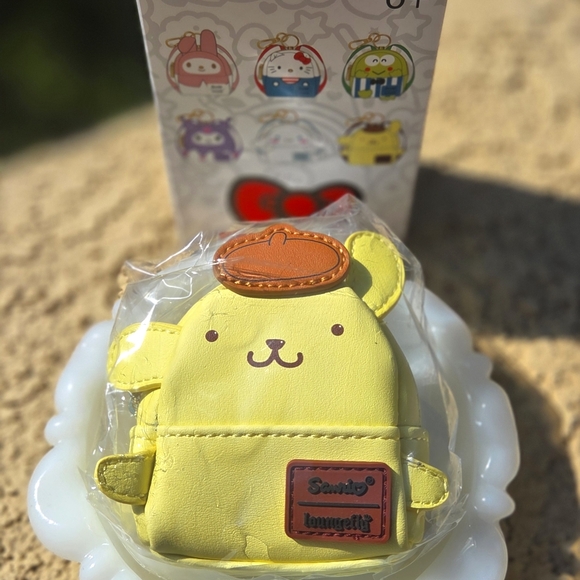 Sanrio Hello Kitty & Friends Mystery Mini Backpack Keychain Charm - Pompompurin - Picture 5 of 5